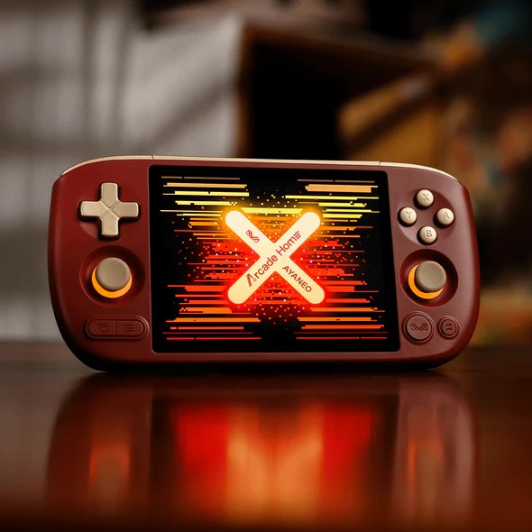 L'Ayaneo Pocket Air Mini Arcade Home Limited Edition a une coque rouge et des commandes dorées.
