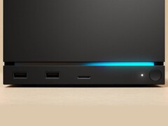 Vue avant de la Valve Steam Machine avec deux ports USB, un port USB-C, une LED d'alimentation, un bouton d'alimentation rond et une bande LED bleue. (Source de l'image : Valve)