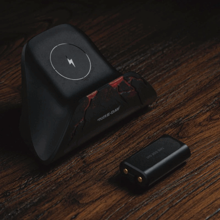 La station de recharge 8BitDo Ultimate pour manettes Xbox - Gears of War : E-Day est fournie avec une batterie sans fil.