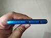 Realme U1 - Au-dessous avec la grille du haut-parleur, le port microUSB, micros, et la prise jack.