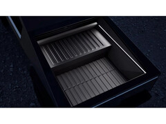 Image promotionnelle de la batterie d'extension d'autonomie Cybertruck de Tesla, présentée dans le lit d'un Cybertruck (Source d'image : Tesla)