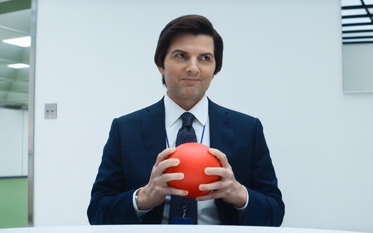 Mark (Adam Scott), endeuillé par la mort de sa femme, choisit l'indemnité de licenciement comme moyen d'échapper au chagrin pendant la moitié de sa vie éveillée. (Source de l'image : Apple TV+)