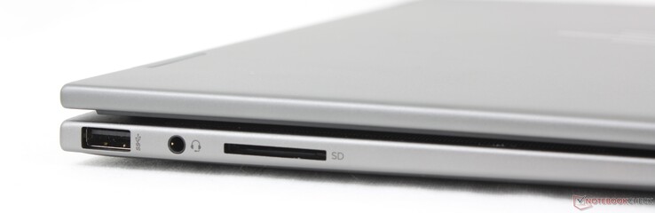 À gauche : USB-A 10 (10 Gbps), casque d'écoute 3,5 mm, lecteur de carte SD