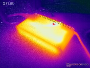 L'adaptateur CA peut atteindre plus de 53°C en cas d'utilisation intensive