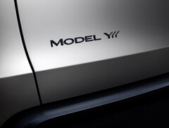 Le logo de la Model Y L laisse entrevoir trois rangées de sièges. (Source de l&#039;image : Tesla)