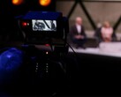 Une photo d'une caméra filmant une interview