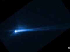 Image montrant les débris projetés de la surface de Dimorpho après un impact intentionnel par la sonde DART de la NASA (Source de l'image : NASA, ESA, STScI, et Hubble ; recadré)