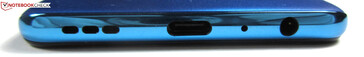 Bas : Haut-parleur, USB-C 2.0, microphone, prise audio 3,5 mm