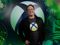 Phil Spencer, PDG de Microsoft Gaming, devant la toile de fond de la Xbox (Image source : Xbox Wire)