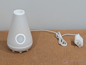 Base de nettoyage et de chargement UV avec câble d'alimentation.