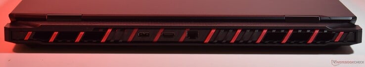 à l'arrière : chargeur propriétaire, HDMI, RJ45-Ethernet