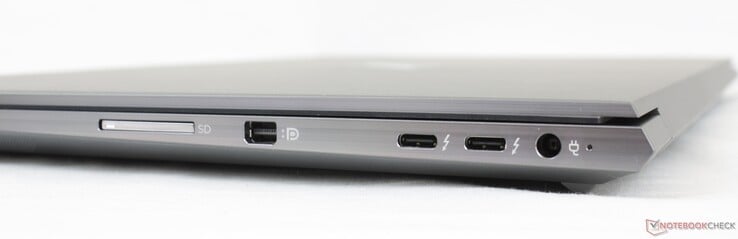A droite : Lecteur de cartes SD, Mini-DisplayPort 1.4, 2x USB-C avec Thunderbolt 4 PD + DP, adaptateur secteur