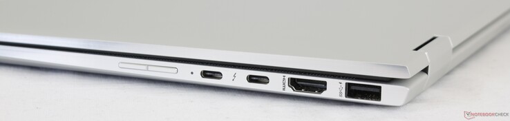 Côté droit : volume, 2 USB C avec Thunderbolt 3, HDMI 1.4, USB A 3.1.