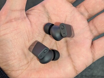 Bouton physique situé en haut des écouteurs.