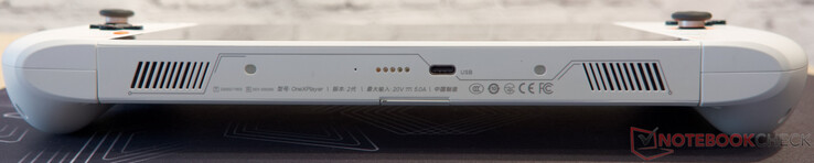en bas : broches pour connecter le clavier, USB C 3.2 avec alimentation et DisplayPort