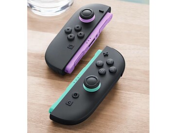 Les nouvelles Joy-Cons ont des accents violets et verts clairs sur les rails et les manettes. (Source de l'image : Nintendo)