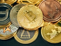 Une pile de crypto-monnaies (Image source : Traxer/Unsplash)