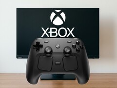 La manette Steam devant un écran d'ordinateur avec le logo Xbox Game Pass