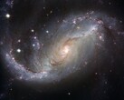 Image montrant la galaxie NGC 1672 et les étoiles de l'univers. (Source de l'image : WikiImages - Pixabay)