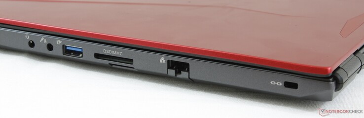 Côté droit : combo audio 3,5 mm, micro 3,5 mm, USB A 3.1, lecteur de carte SD, SIM (désactivé), Ethernet gigabit, verrou de sécurité Kensington.