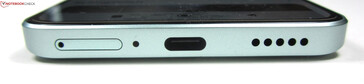 bas : Double emplacement SIM, microphone, USB-C 2.0, haut-parleur