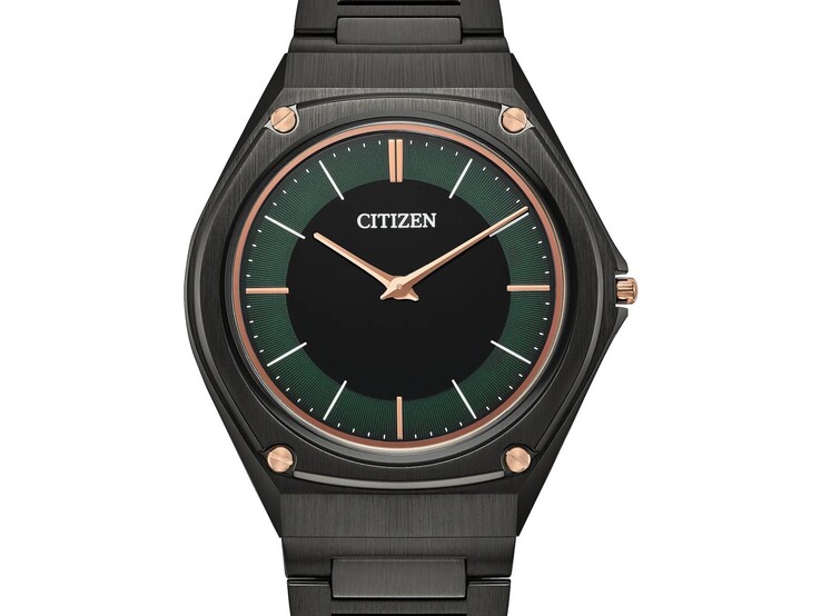 La montre AR5065-54W se distingue par un cadran vert forêt saisissant, avec un centre noir et des aiguilles, des index et des vis de lunette de couleur or rose.