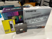 Une photo montrant le kit mémoire Corsair 32GB DDR5, le CPU AMD Ryzen 5 7600X, la carte mère Gigabyte B850M Eagle et le Cooler Master 240L AIO