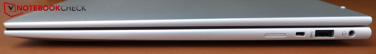 A droite : Fente pour carte SIM, fente Kensington, USB-A (5 Gbps), prise casque 3,5 mm