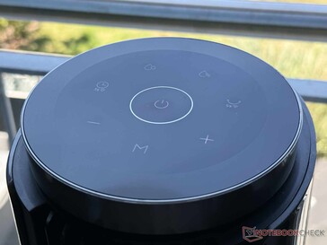 Appuyez sur le panneau de commande tactile situé sur le dessus de l'appareil