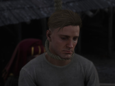 Une capture d'écran montrant Sir Hans Capon pendu dans Kingdom Come Deliverance 2
