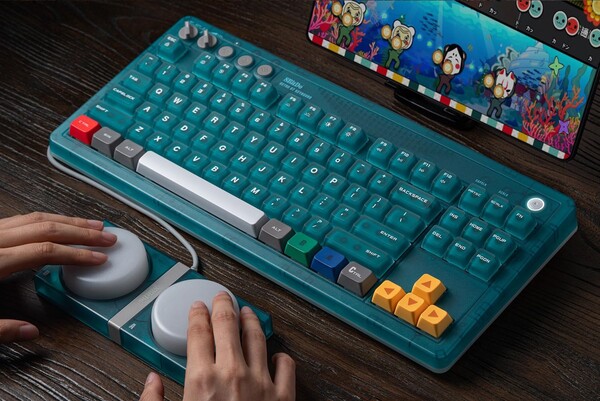 Le clavier mécanique Retro 87, édition N64, est livré avec deux « Super Buttons » filaires.