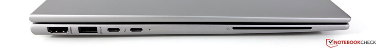 A gauche : HDMI 2.0, USB-A 3.2 Gen.1 (5 GBit/s, alimenté), 2x USB-C 4.0 avec Thunderbolt 4 (40 GBit/s, DisplayPort-ALT mode 1.4, Power Delivery 3.0), lecteur de cartes à puce
