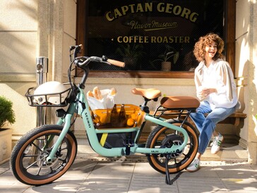 Le Segway Muxi, vélo électrique à entraînement direct, est équipé de paniers à l'avant et au milieu, et d'un siège passager à l'arrière. (Source de l'image : Segway)