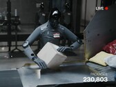Une capture d'écran du livestream montre la figure AI 03 en train de trier des colis.