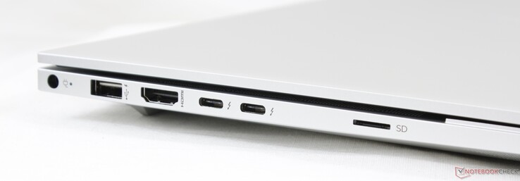 Côté gauche : entrée secteur, USB A 3.0 (5 Gbit/s), HDMI 2.0a, 2 USB C avec Thunderbolt 3 et DisplayPort 1.4 (40 Gbit/s).
