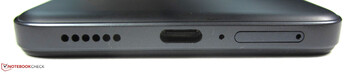 En bas : double emplacement pour carte SIM, microphone, USB-C 2.0, haut-parleur
