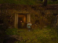 Sur la photo, une capture d'écran de la bande-annonce de Swordhaven : Iron Conspiracy, montrant le protagoniste tenant une épée devant l'entrée d'une mine. (Source de l'image : Steam)