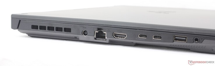 À gauche : adaptateur secteur, Gigabit RJ-45, HDMI 2.1, 1x USB-C 3.2 Gen. 2 avec DisplayPort + Power Delivery + G-Sync, 1x USB-C 4.0, 1x USB-A 3.2 Gen. 1, casque d'écoute 3,5 mm
