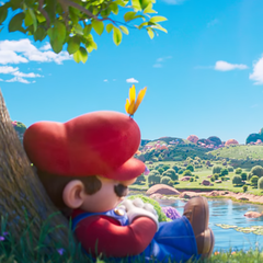 Dans un moment de calme avant l&#039;aventure cosmique, Mario fait une sieste sous un arbre en technicolor, évoquant le calme avant la tempête interstellaire dans le film Super Mario Galaxy.