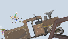 Scène de jeu de Happy Wheels montrant un père et son enfant roulant à vélo vers une grande locomotive sur un parcours d'obstacles créé par un utilisateur.