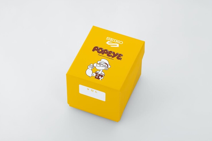 Coffret de présentation jaune en édition spéciale pour la Seiko 5 Sports x Popeye HDB013, orné du logo Popeye et d'illustrations commémoratives.