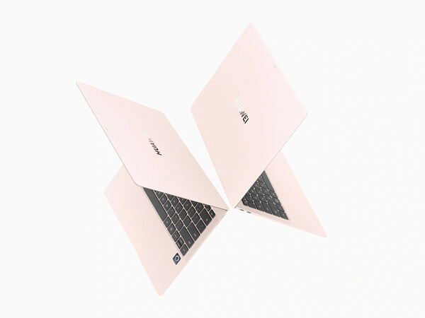 Le Huawei MateBook Pro en Dawn Pink a des touches noires mais un trackpad rose. (Source de l'image : Huawei)