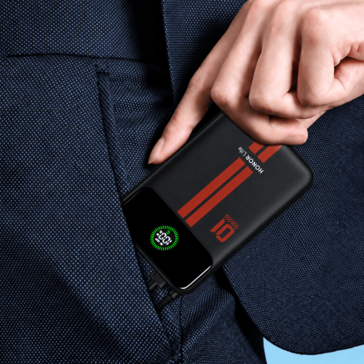 Batterie externe Honor Life avec écran intégré présentée dans une poche de vêtement