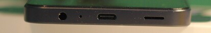 Bas : 3.port audio de 5 mm, microphone, port USB-C, haut-parleur