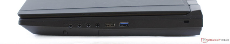 Côté droit : entrée audio 3,5 mm, microphone, sortie audio, écouteurs, USB A 2.0, USB A 3.1, verrou de sécurité Kensington.