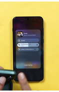 L'interface de partage audio d'un téléphone OnePlus affichant deux paires d'écouteurs sans fil connectés, disponibles pour une lecture audio simultanée.