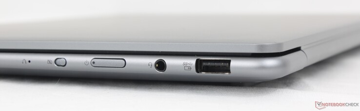 A droite : Bouton de réinitialisation Lenovo, interrupteur de l'appareil photo, bouton d'alimentation, casque d'écoute de 3,5 mm, USB-A (5 Gbps)