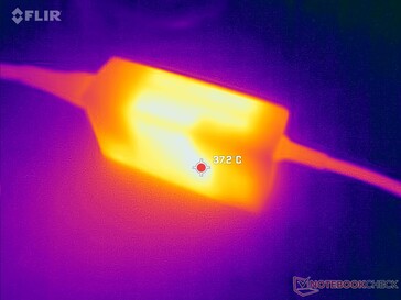 L'adaptateur CA peut atteindre plus de 37°C en cas d'utilisation intensive