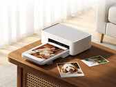 La nouvelle imprimante photo de bureau 2 coûte environ 103 dollars sur Youpin. Sur la photo : une image promotionnelle montrant l'imprimante en action.