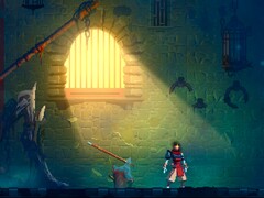 Capture d'écran de Dead Cells Steam avec un personnage debout dans un rayon de soleil dans une cellule de prison